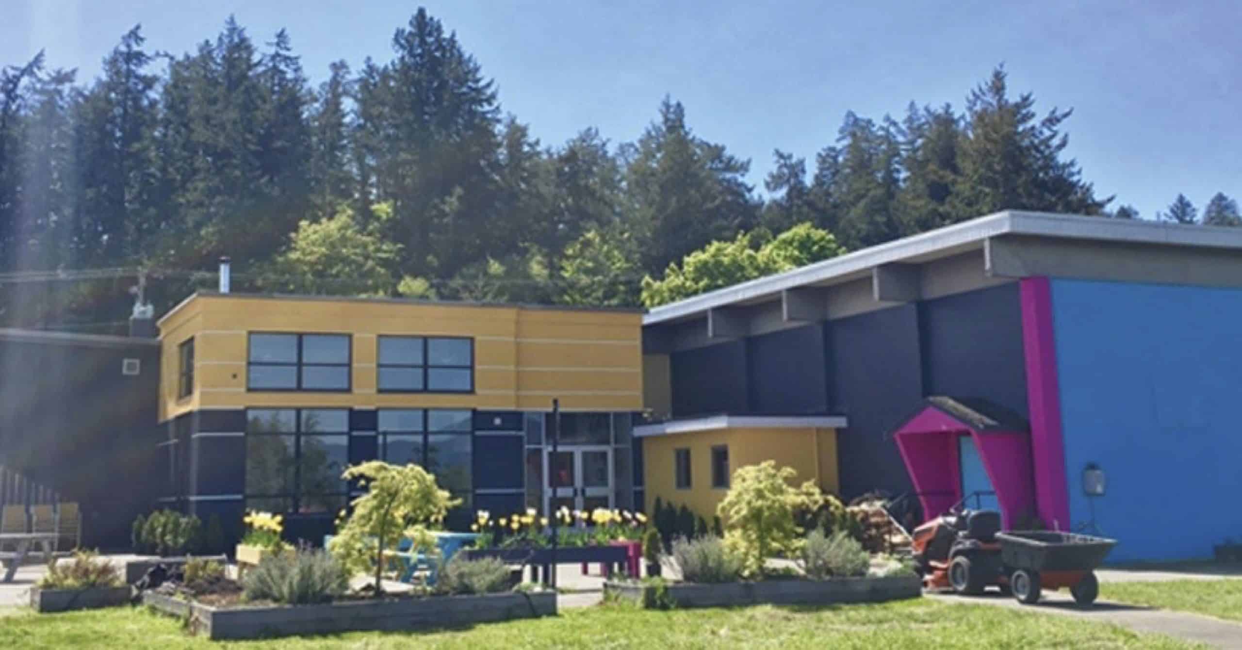 Photo of the building from the outside on a sunny day. 